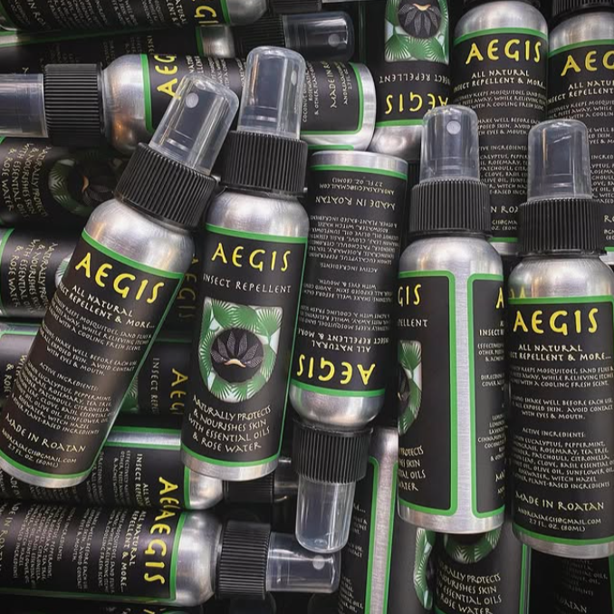 Multiple Aegis insect repellent bottles stacked together