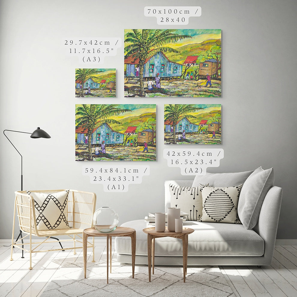 Set of four colorful paintings of a village scene on a gray wall above a sofa.