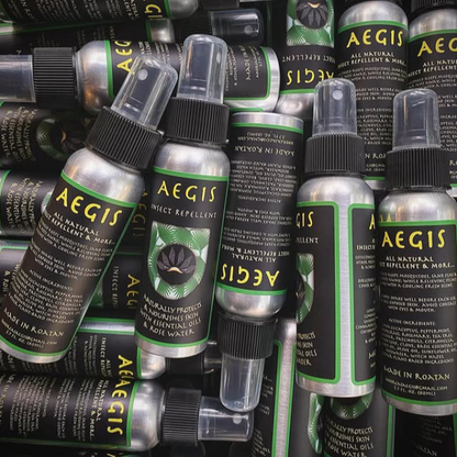 Multiple Aegis insect repellent bottles stacked together